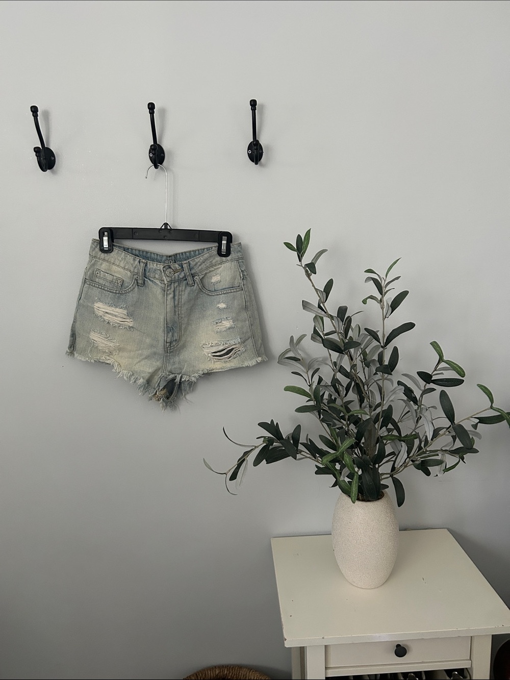 BDG Light Wash “Super High Rise Cheeky” Denim Cutoff Shorts